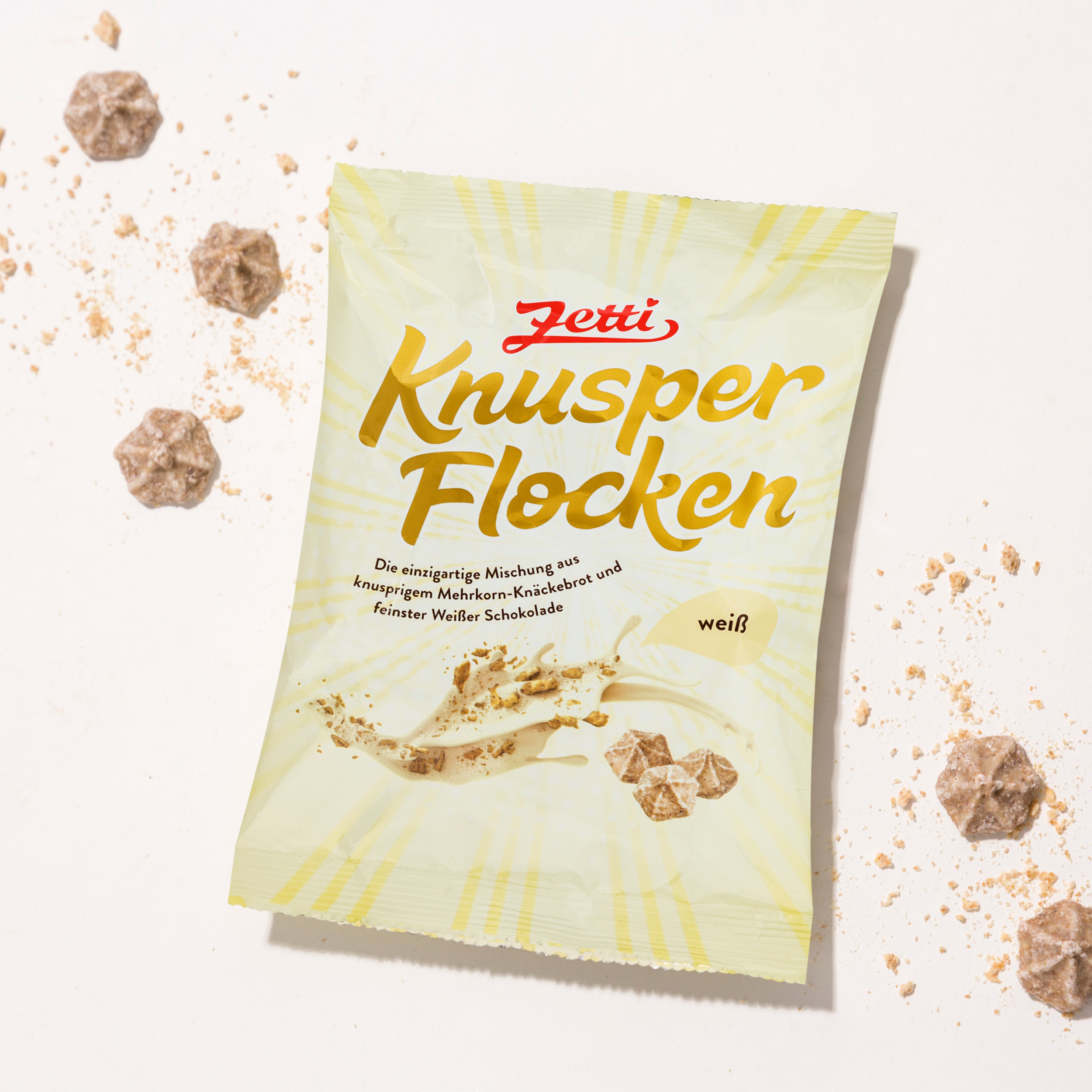 Vorderseite einer Packung Zetti Knusperflocken weiß eingebettet in Zetti Knusperflocken weiß